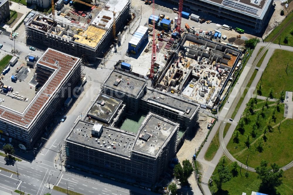 München from above - Construction site to build a new multi-family residential complex meinraum in Domagkpark in the district Schwabing-Freimann in Munich in the state Bavaria, Germany