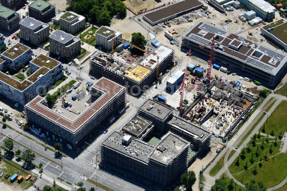 München from the bird's eye view: Construction site to build a new multi-family residential complex meinraum in Domagkpark in the district Schwabing-Freimann in Munich in the state Bavaria, Germany