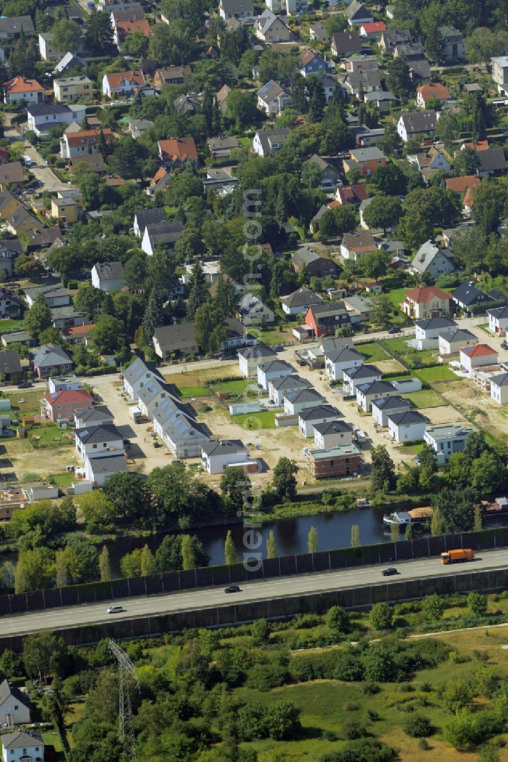 Berlin from above - Construction site to build a new residential complex at the Minzeweg in front of the Teltowkanal in Berlin in Germany