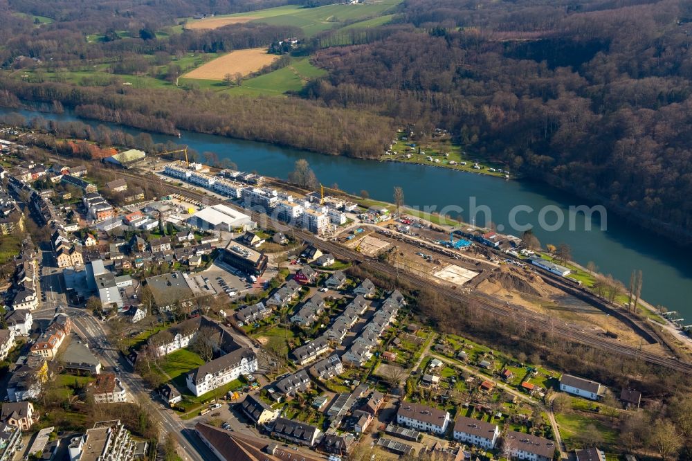 Kettwig from the bird's eye view: Construction site of the residential area Wohnen am Ruhrbogen on the riverbank of the Ruhr in Kettwig in the state of North Rhine-Westphalia