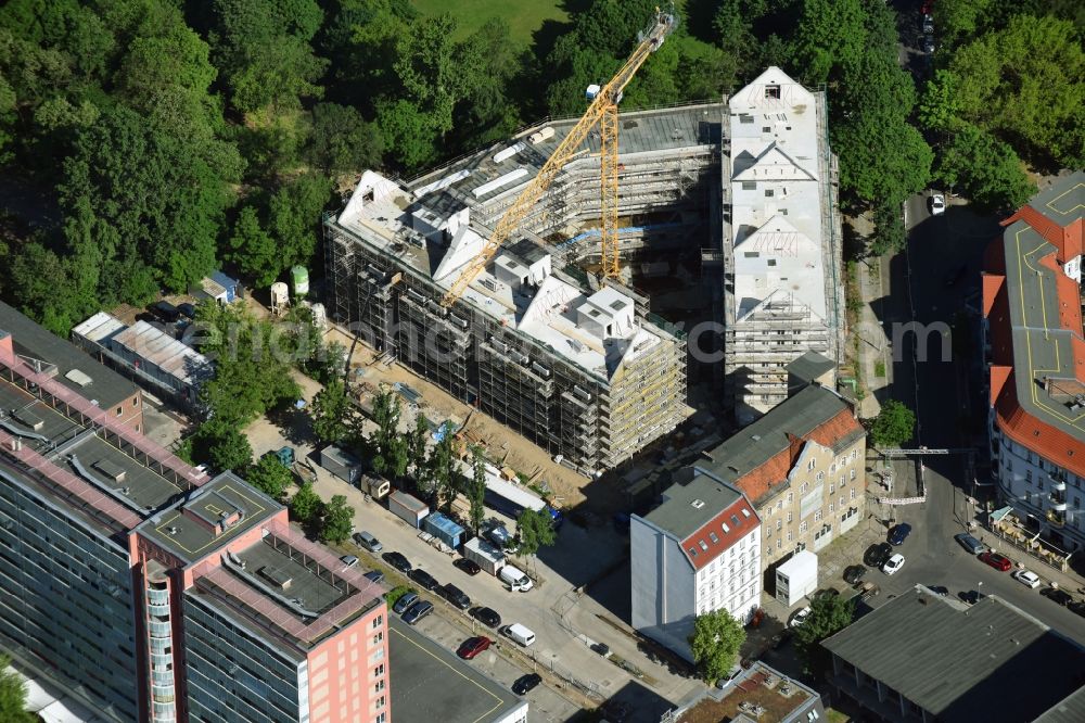 Berlin from above - Construction site for the new building of a block of flats in the Rathausstrasse in Berlin, Germany