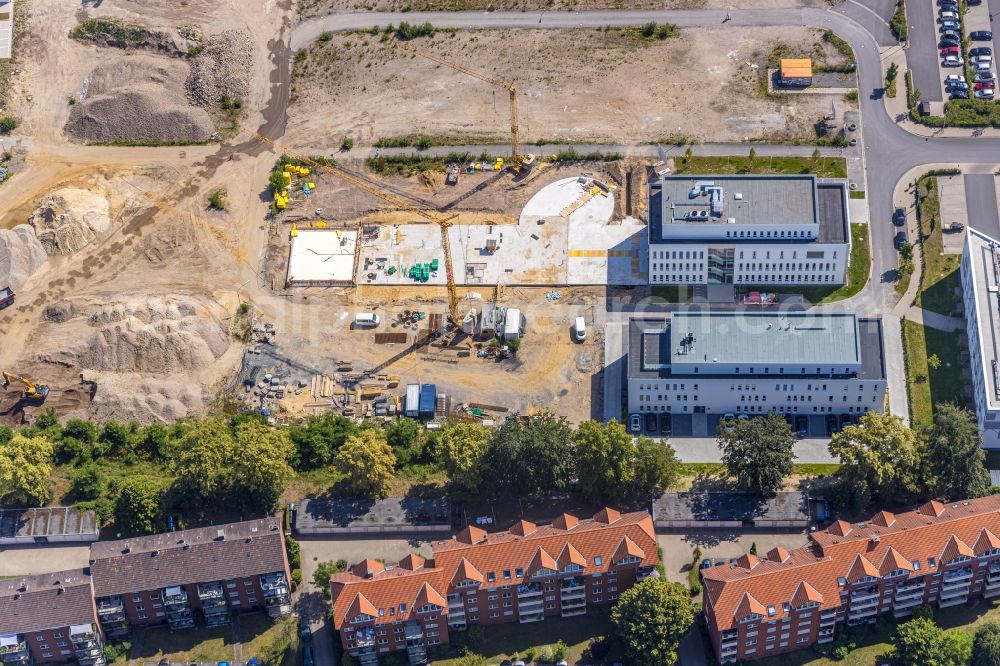 Hamm from the bird's eye view: Construction site for the new multi-family housing development Paracelsuspark on Marker Allee in Hamm in the state of North Rhine-Westphalia