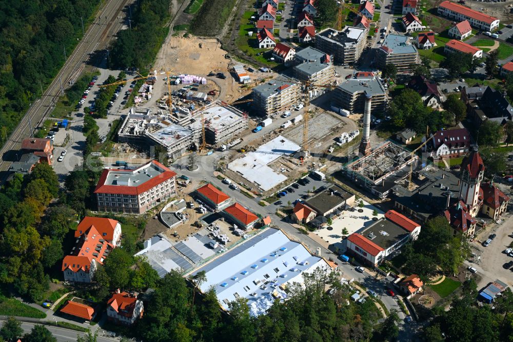 Beelitz from above - Residential area construction site of a mixed development with multi-family houses and single-family houses- New building at the Quartier Beelitz-Heilstaetten in Beelitz in the state Brandenburg, Germany