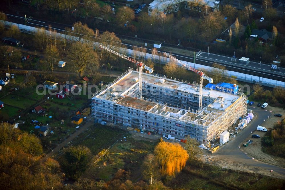 Aerial photograph Hamburg - Construction site for the multi-family residential building on Alte Woehr - Saarlandstieg in the district Winterhude in Hamburg, Germany