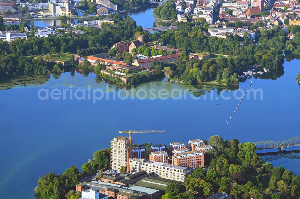 Aerial photograph Berlin - Construction site for the construction of a new multi-family residential building on Eiswerderstrasse on the island of Eiswerder in the Spandau Hakenfelde district in Berlin, Germany