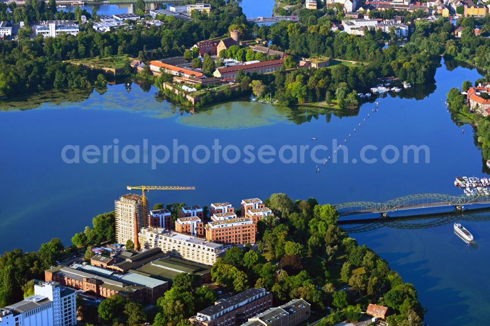 Berlin from above - Construction site for the construction of a new multi-family residential building on Eiswerderstrasse on the island of Eiswerder in the Spandau Hakenfelde district in Berlin, Germany