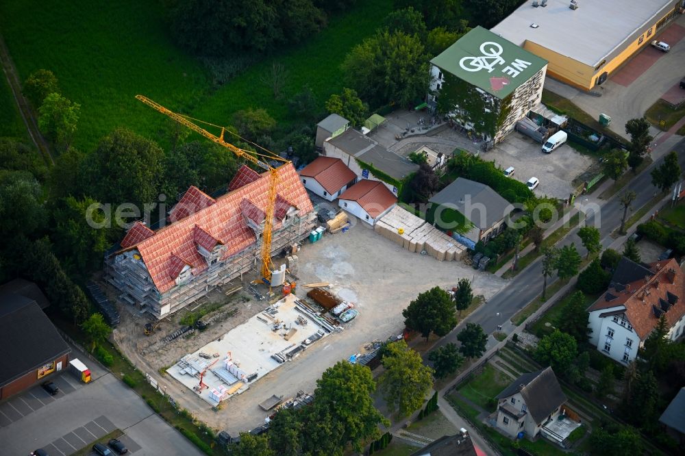 Altlandsberg from above - Construction site for the multi-family residential building on Berliner Allee in Altlandsberg in the state Brandenburg, Germany