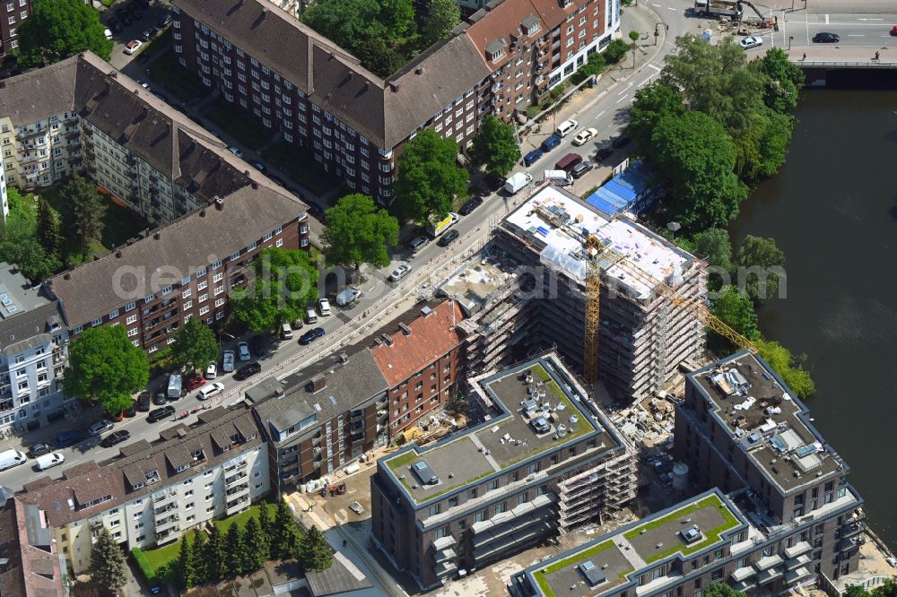 Hamburg from the bird's eye view: Construction site for the multi-family residential building in Blockhouse-Quartier on Hufnerstrasse - Osterbekkai in the district Barmbek in Hamburg, Germany