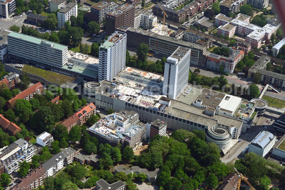 Hamburg from the bird's eye view: Construction site for the multi-family residential building in Blockhouse-Quartier on Hufnerstrasse - Osterbekkai in the district Barmbek in Hamburg, Germany