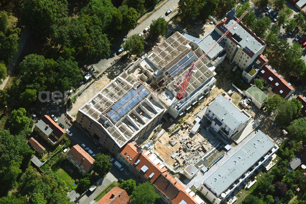 Potsdam from the bird's eye view: Construction site for the multi-family residential building on the former Gelaende of Parkstudios in the district Babelsberg Nord in Potsdam in the state Brandenburg, Germany