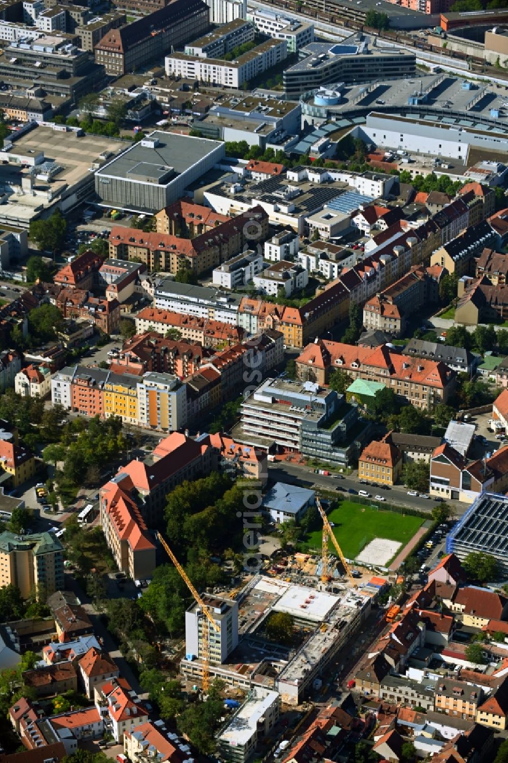 Erlangen from the bird's eye view: Construction site for the multi-family residential building Fahrstrasse corner Suedliche Stadtmauerstrasse in Erlangen in the state Bavaria, Germany