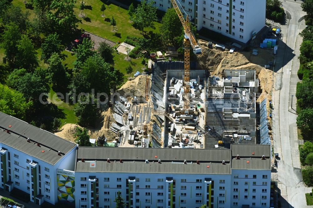 Berlin from above - Construction site for the multi-family residential building on Feldberger Ring in the district Kaulsdorf in Berlin, Germany