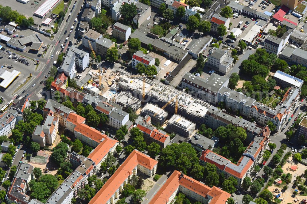 Berlin from the bird's eye view: Construction site for the multi-family residential building on Glasower Strasse in the district Neukoelln in Berlin, Germany