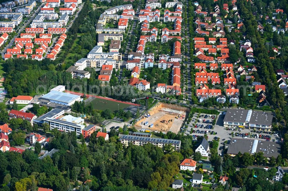 Glienicke/Nordbahn from the bird's eye view: Construction site for the multi-family residential building on Ahornallee in Glienicke/Nordbahn in the state Brandenburg, Germany