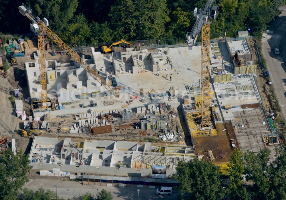 Aerial photograph Berlin - Construction site for the multi-family residential building on Hartriegelstrasse - Moosstrasse in the district Niederschoeneweide in Berlin, Germany