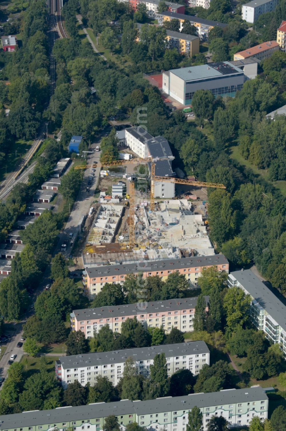 Aerial image Berlin - Construction site for the multi-family residential building on Hartriegelstrasse - Moosstrasse in the district Niederschoeneweide in Berlin, Germany