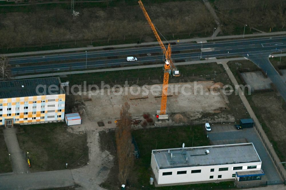 Aerial image Neuruppin - Construction site for the multi-family residential building on Heinrich-Rau-Strasse in Neuruppin in the state Brandenburg, Germany