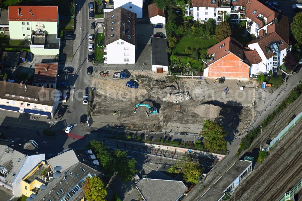 Aerial image Gröbenzell - Construction site for the multi-family residential building Hermann-Loens-Strasse corner Kirchenstrasse in Groebenzell in the state Bavaria, Germany