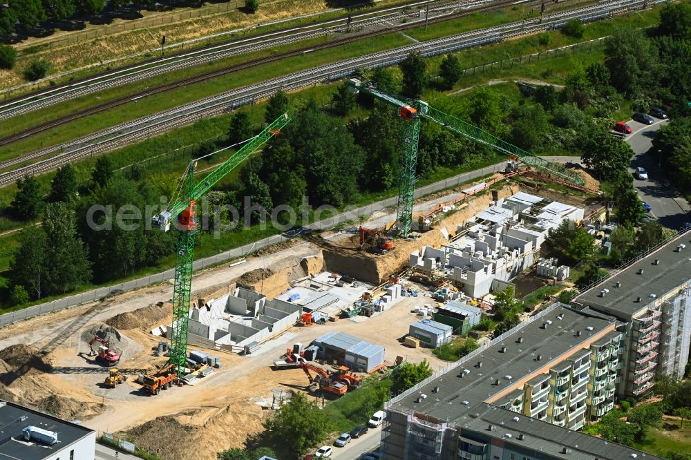 Berlin from the bird's eye view: Construction site for the multi-family residential building Hoyerswerdaer Strasse corner Louis-Lewin-Strasse in the district Hellersdorf in Berlin, Germany