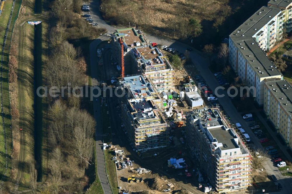 Berlin from above - Construction site for the multi-family residential building Hoyerswerdaer Strasse corner Louis-Lewin-Strasse in the district Hellersdorf in Berlin, Germany