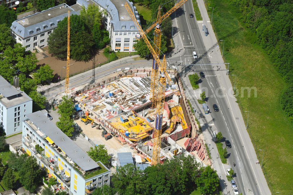 München from the bird's eye view: Construction site for the multi-family residential building Isarleiten with rental and serviced apartments on street Wolfratshauser Strasse - Neunkirchner Strasse in Munich in the state Bavaria, Germany