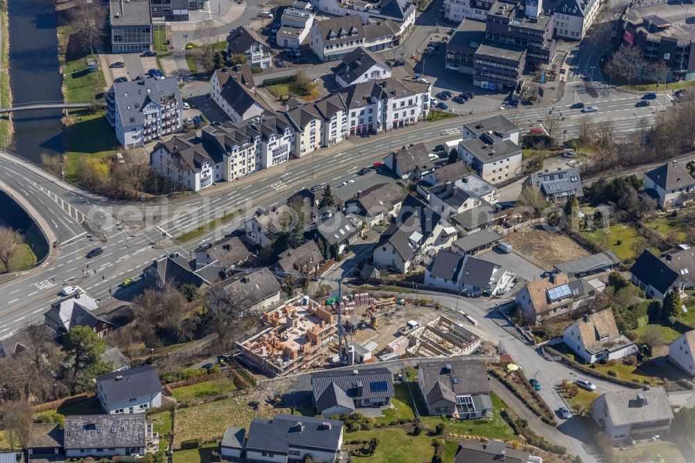 Aerial photograph Meschede - Construction site for the multi-family residential building on Klausenweg - Berghauser Weg in Meschede at Sauerland in the state North Rhine-Westphalia, Germany