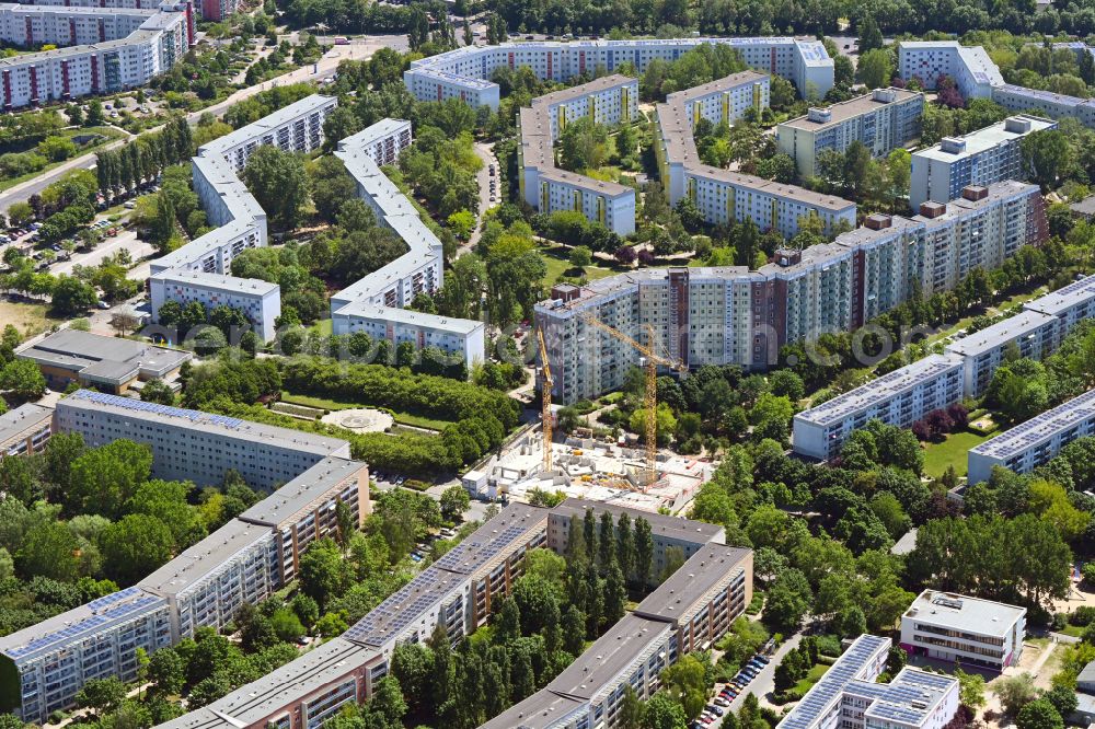 Berlin from the bird's eye view: Construction site for the multi-family residential building Lion-Feuchtwanger-Strasse in the district Hellersdorf in Berlin, Germany