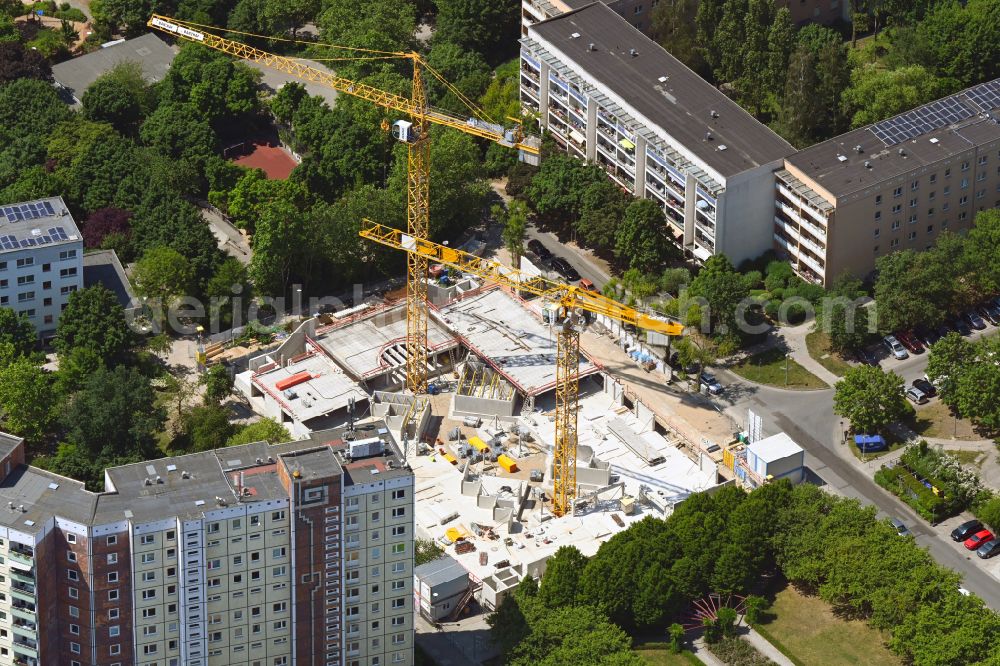 Berlin from the bird's eye view: Construction site for the multi-family residential building Lion-Feuchtwanger-Strasse in the district Hellersdorf in Berlin, Germany