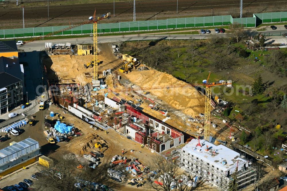 Aerial image Michendorf - Construction site for the multi-family residential building on street Buednergasse - Poststrasse in Michendorf in the state Brandenburg, Germany