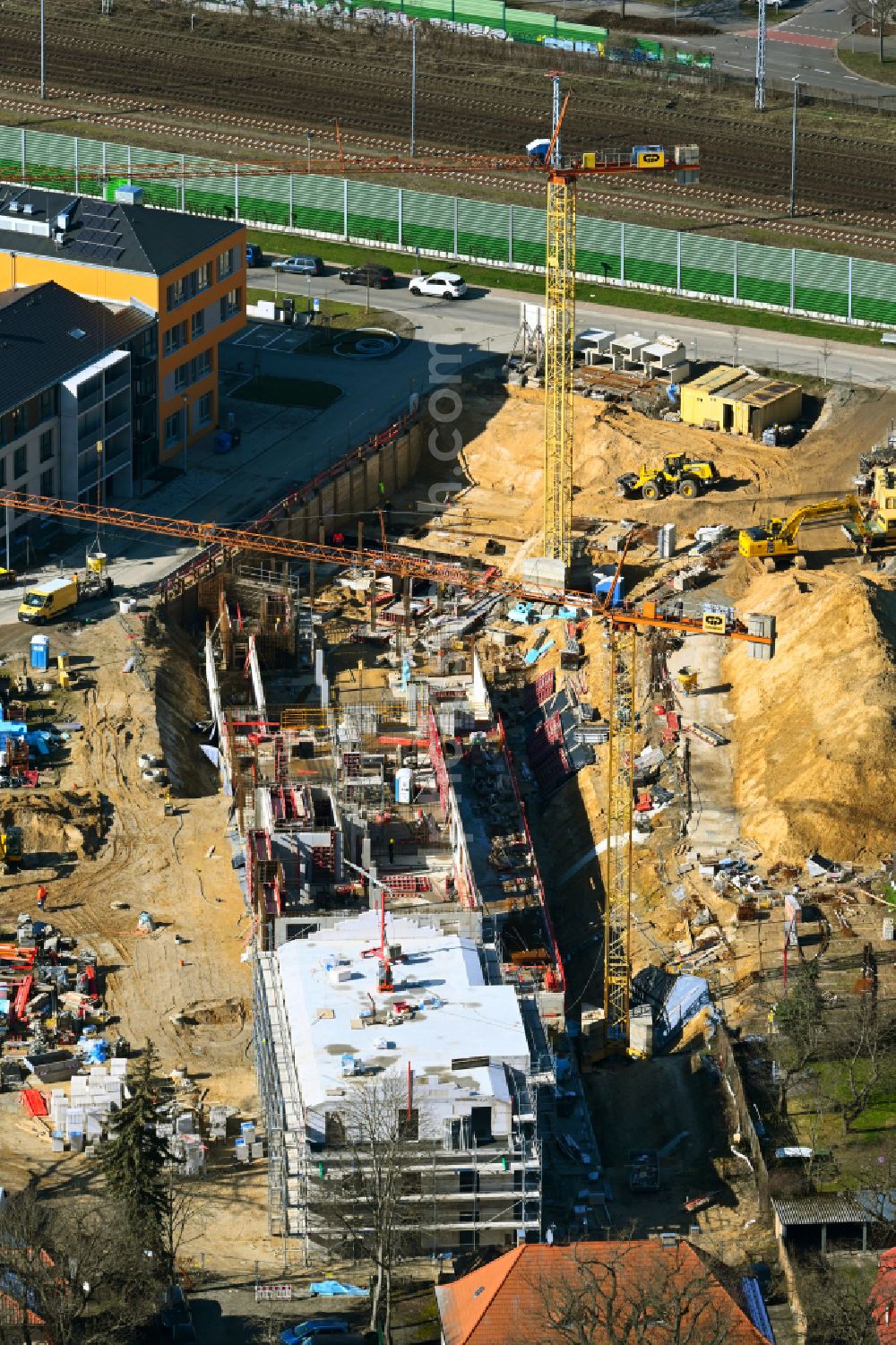 Aerial photograph Michendorf - Construction site for the multi-family residential building on street Buednergasse - Poststrasse in Michendorf in the state Brandenburg, Germany