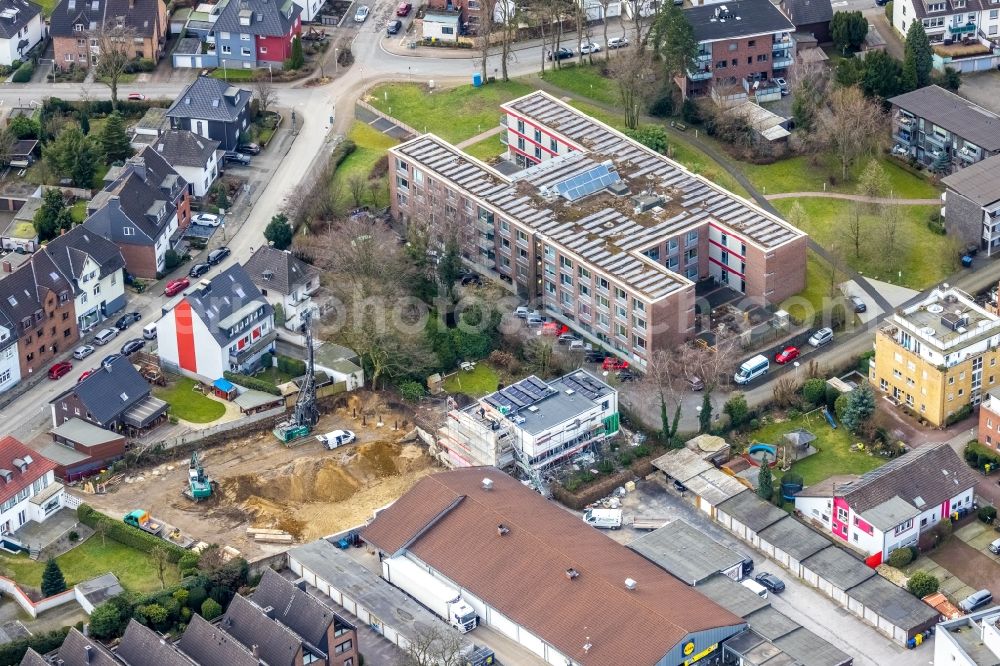 Bottrop from the bird's eye view: Construction site for the multi-family residential building next to the Seniorenzentrum Kaethe Braus on Neustrasse in the district Stadtmitte in Bottrop at Ruhrgebiet in the state North Rhine-Westphalia, Germany