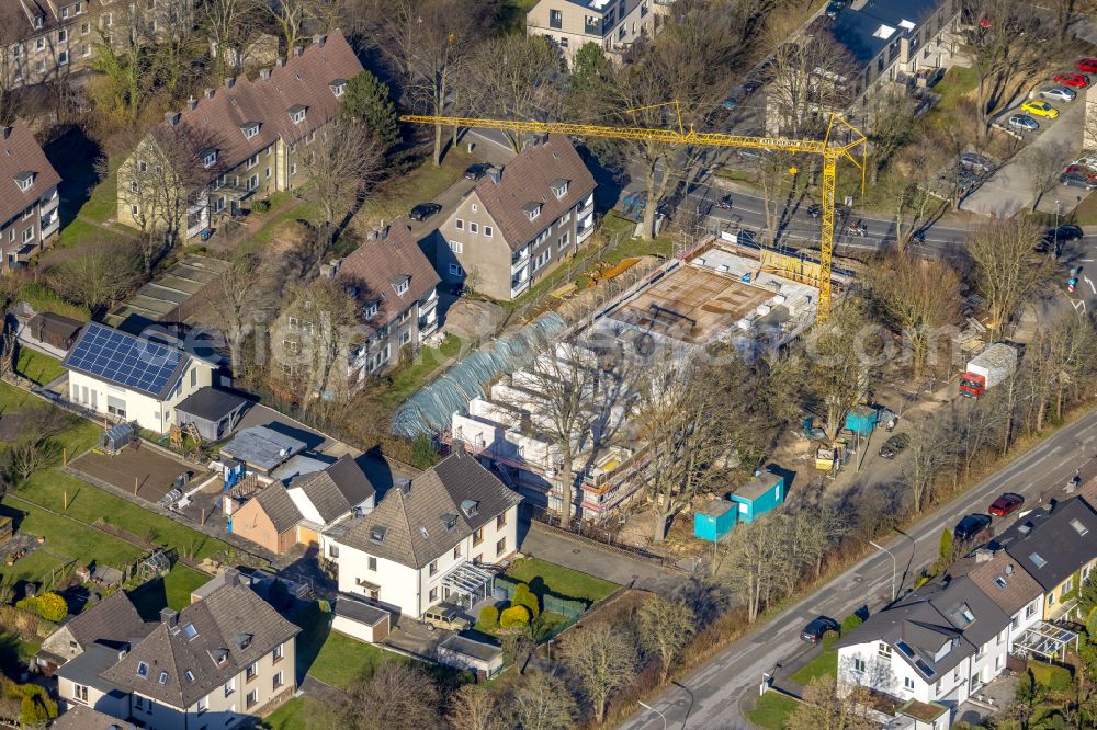 Aerial image Niederwenigern - Construction site for the multi-family residential building on street Isenbergstrasse in Niederwenigern at Ruhrgebiet in the state North Rhine-Westphalia, Germany