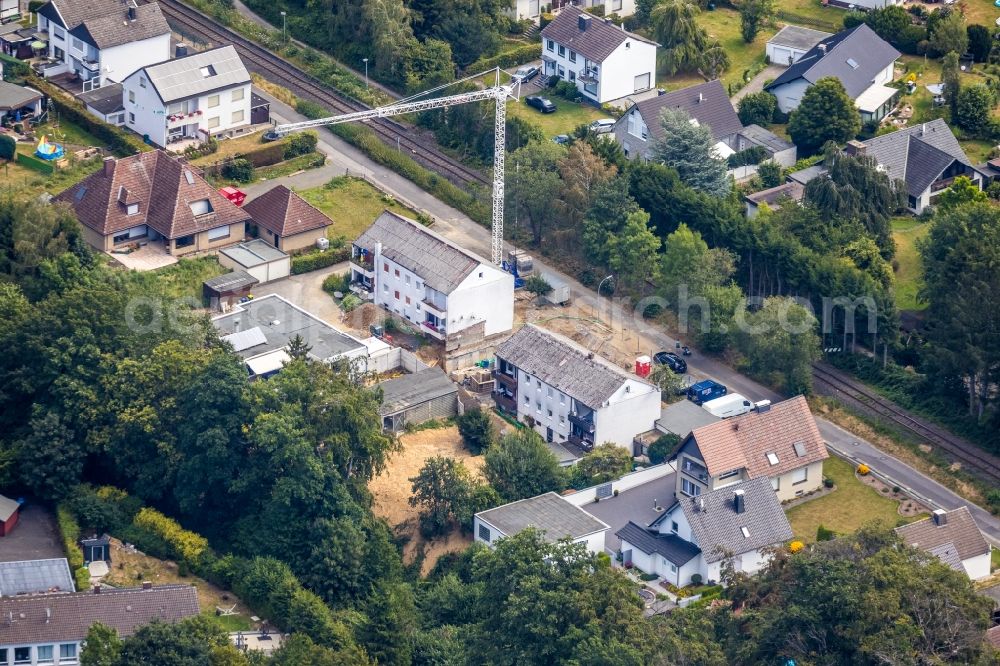 Fröndenberg/Ruhr from the bird's eye view: Construction site for the multi-family residential building on Talstrasse - Im Rottland in the district Ardey in Froendenberg/Ruhr in the state North Rhine-Westphalia, Germany