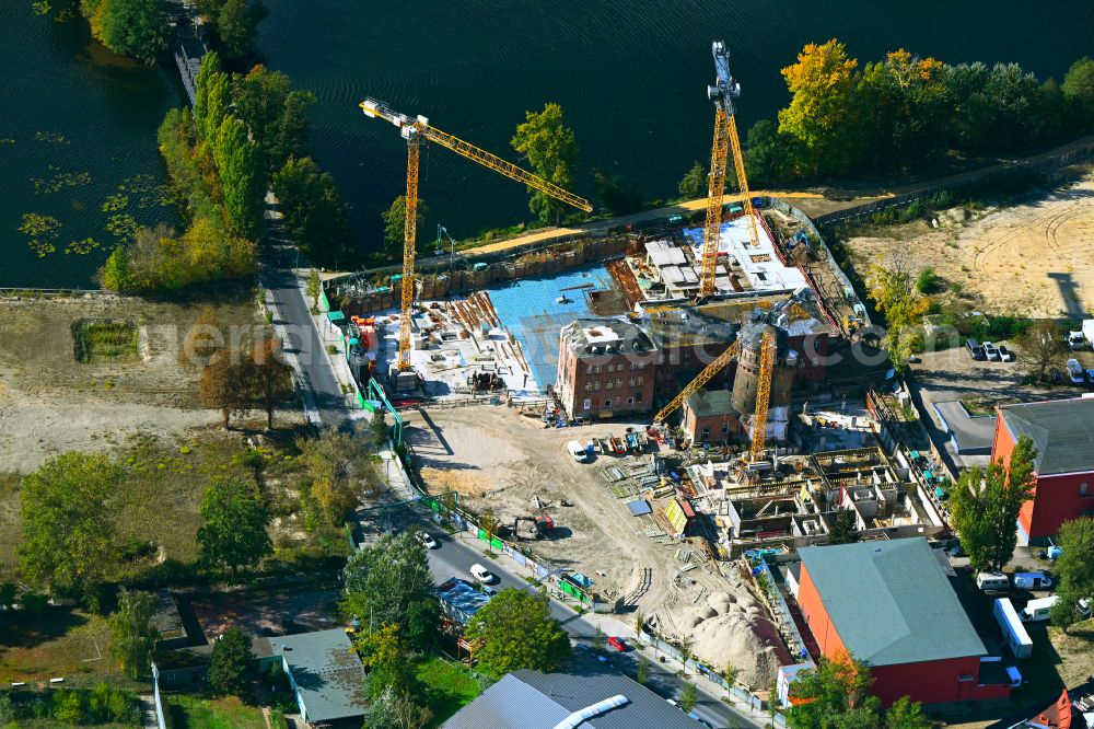 Berlin from above - Construction site for the multi-family residential building on street Kleine Eiswerderstrasse in the district Haselhorst in Berlin, Germany