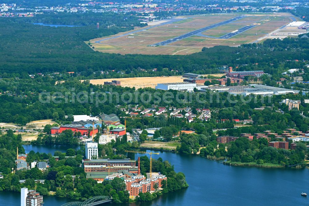 Berlin from above - Construction site for the multi-family residential building on street Kleine Eiswerderstrasse in the district Haselhorst in Berlin, Germany