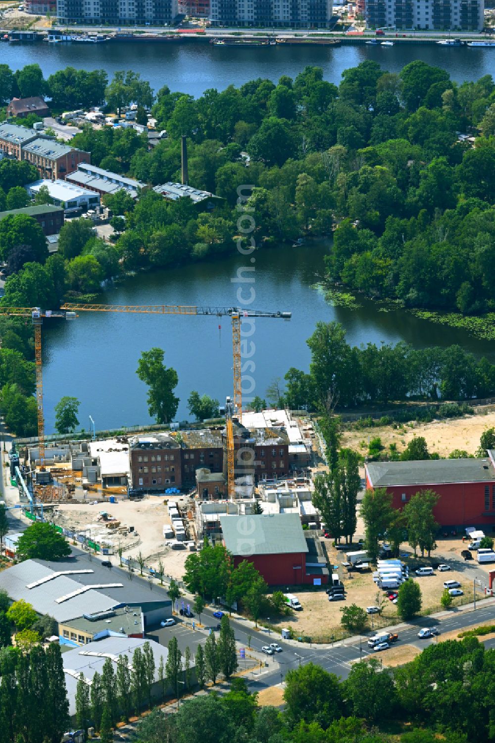 Berlin from the bird's eye view: Construction site for the multi-family residential building on street Kleine Eiswerderstrasse in the district Haselhorst in Berlin, Germany