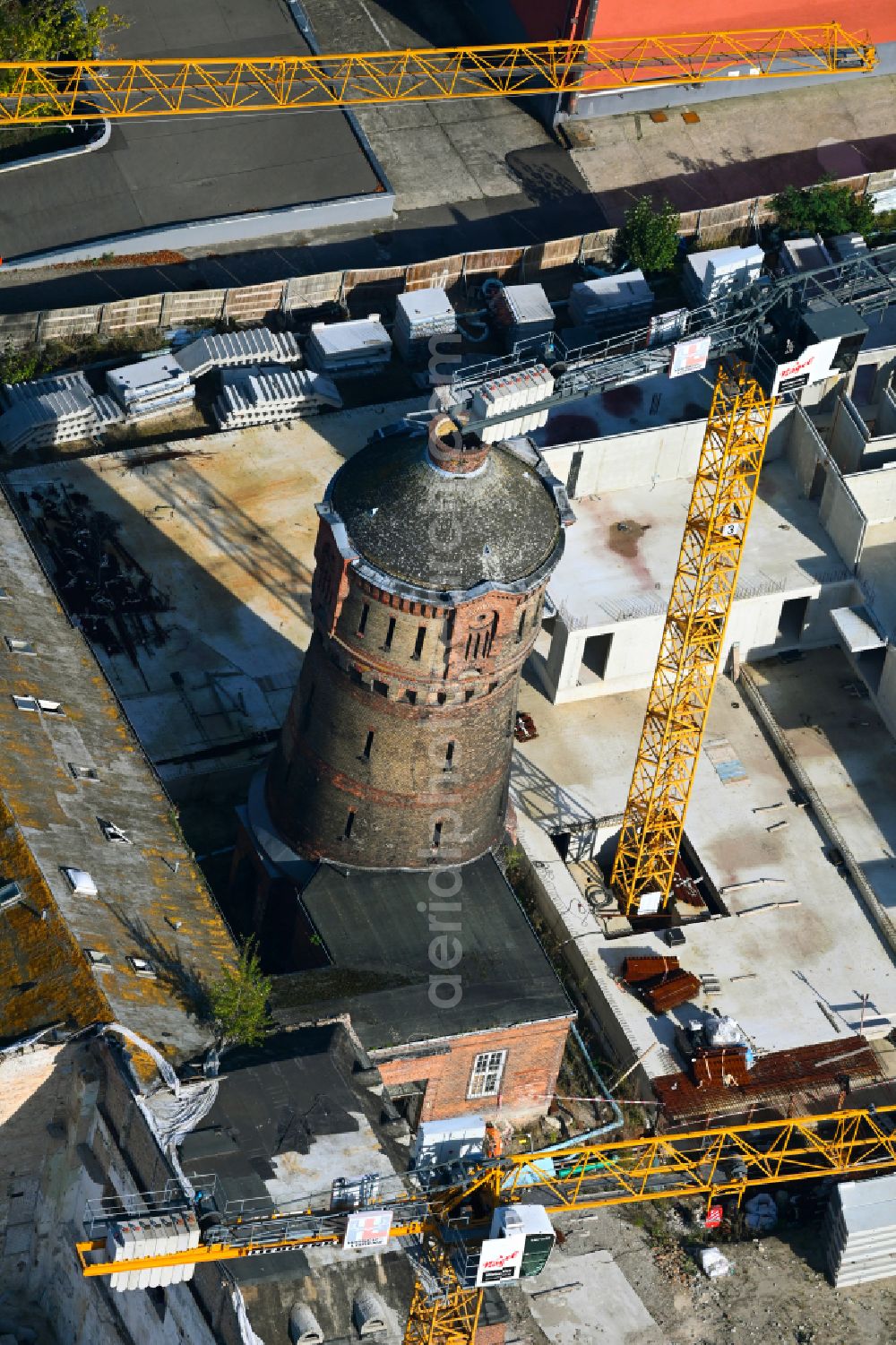 Berlin from the bird's eye view: Construction site for the multi-family residential building on street Kleine Eiswerderstrasse in the district Haselhorst in Berlin, Germany