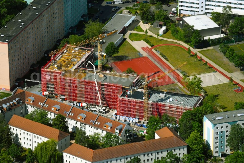 Berlin from the bird's eye view: Construction site for the multi-family residential building on Neustrelitzer Strasse in the district Hohenschoenhausen in Berlin, Germany