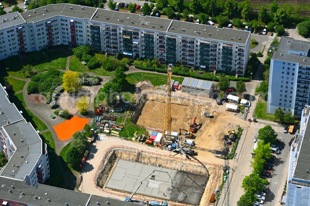 Berlin from above - Construction site for the multi-family residential building on street Lily-Braun-Strasse in the district Kaulsdorf in Berlin, Germany