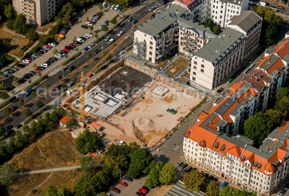 Leipzig from the bird's eye view: Construction site for the multi-family residential building Gerichtsweg - Perthesstrasse in the district Reudnitz in Leipzig in the state Saxony, Germany