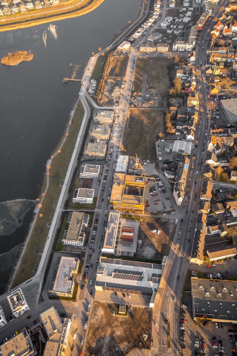 Dortmund from the bird's eye view: Construction site for the multi-family residential building on Phoenixseestrasse in the district Hoerde in Dortmund in the state North Rhine-Westphalia, Germany