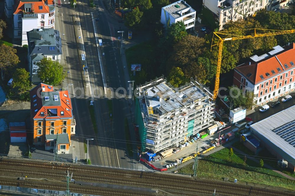 Leipzig from the bird's eye view: Construction site for the multi-family residential building of the project Petzscher Eck on Petzscher Strasse corner Delitzscher Strasse in the district Eutritzsch in Leipzig in the state Saxony, Germany