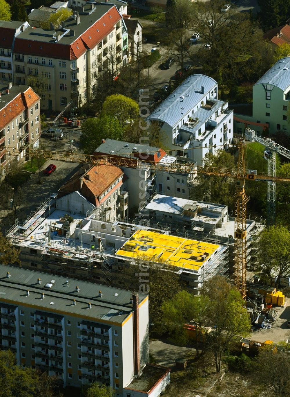 Aerial image Berlin - Construction site for the multi-family residential building on Schlossallee in the district Niederschoenhausen in Berlin, Germany