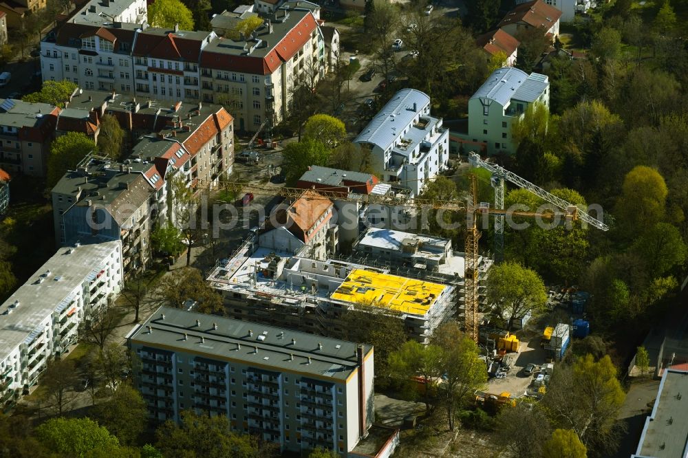 Aerial photograph Berlin - Construction site for the multi-family residential building on Schlossallee in the district Niederschoenhausen in Berlin, Germany