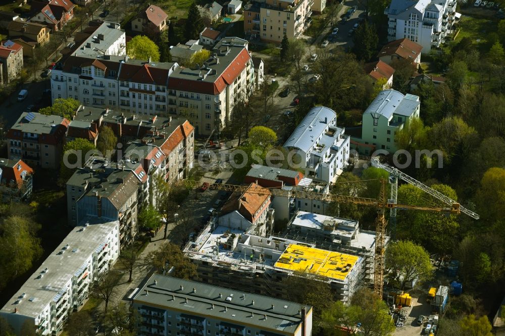 Berlin from above - Construction site for the multi-family residential building on Schlossallee in the district Niederschoenhausen in Berlin, Germany