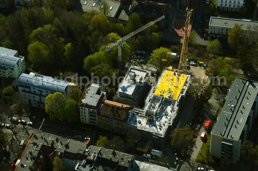 Aerial photograph Berlin - Construction site for the multi-family residential building on Schlossallee in the district Niederschoenhausen in Berlin, Germany