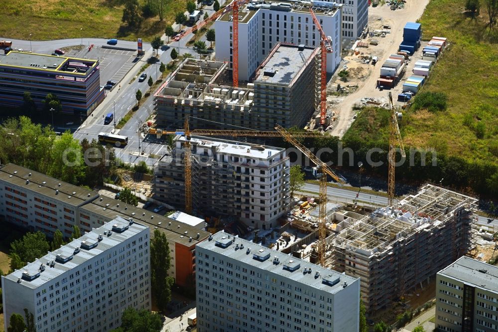 Berlin from the bird's eye view: Construction site for the multi-family residential building on Schuetzenstrasse in the district Altglienicke in Berlin, Germany