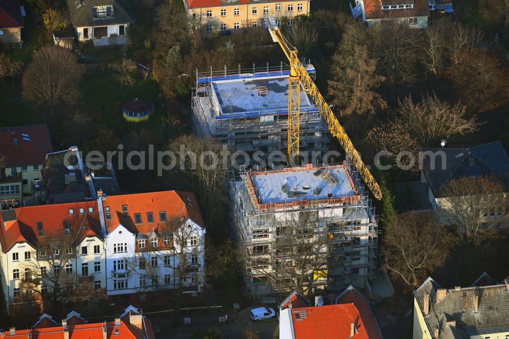 Berlin from above - Construction site for the multi-family residential building on Uhlandstrasse in the district Niederschoenhausen in Berlin, Germany