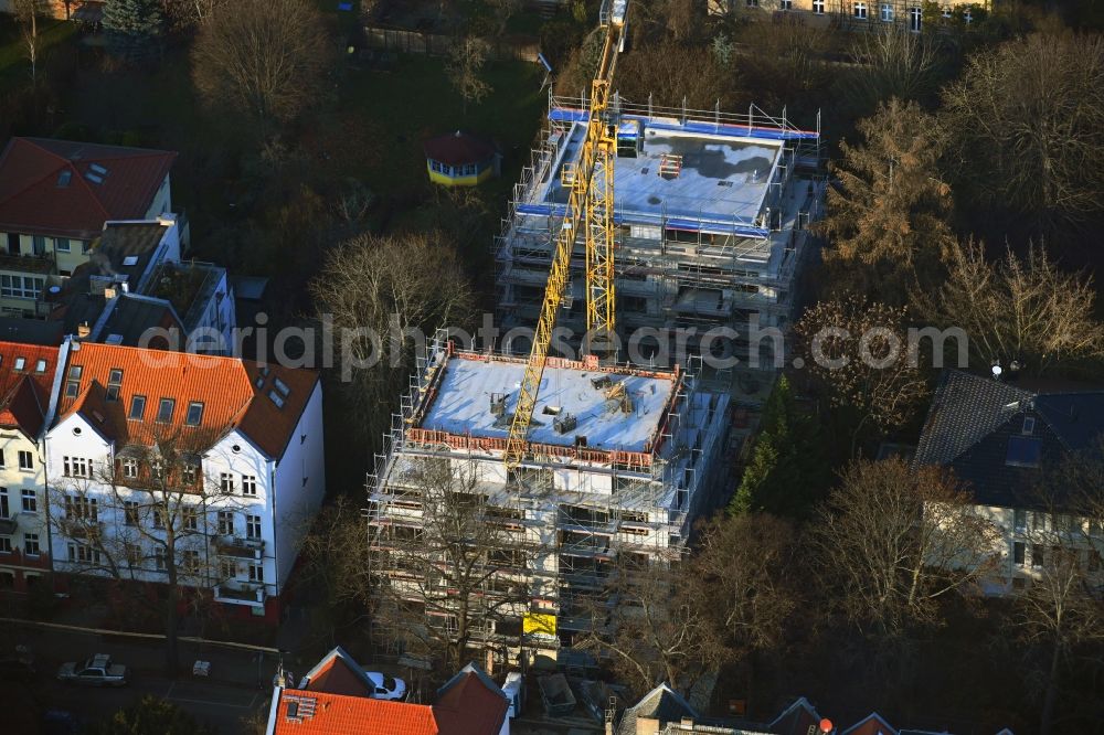 Berlin from the bird's eye view: Construction site for the multi-family residential building on Uhlandstrasse in the district Niederschoenhausen in Berlin, Germany