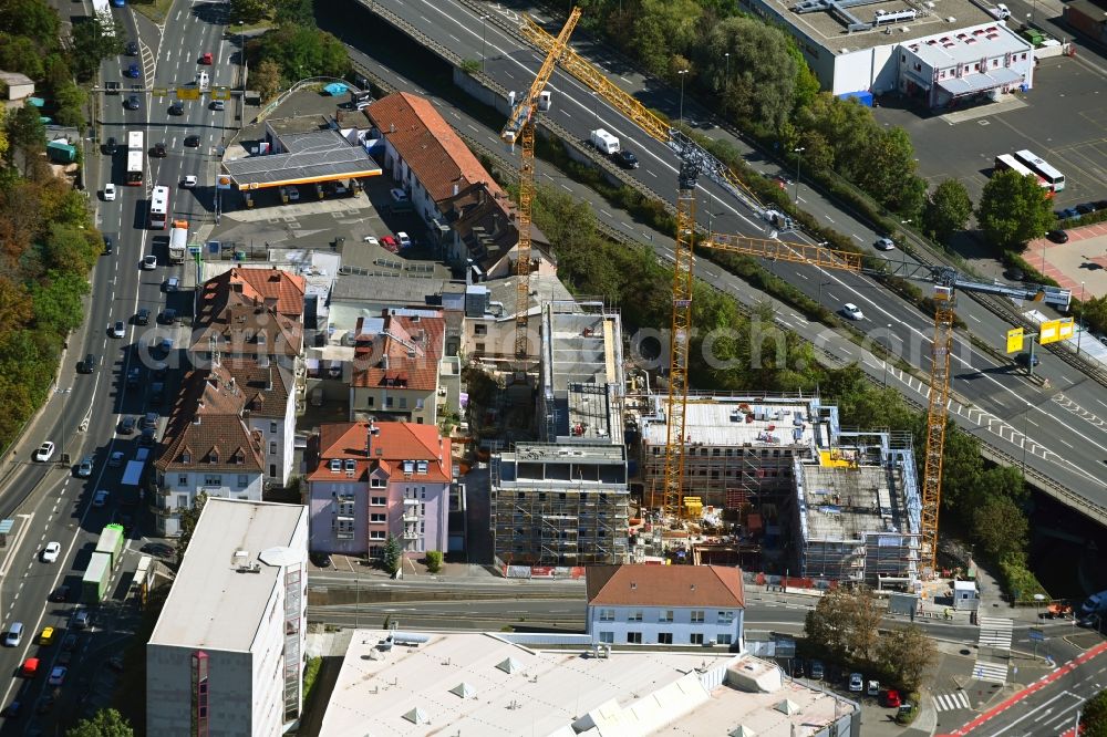 Würzburg from the bird's eye view: Construction site for the multi-family residential building on Urlaubstrasse in Wuerzburg in the state Bavaria, Germany